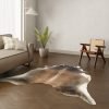 Koeienhuid kleed warm bruin wit 220x200 cm.