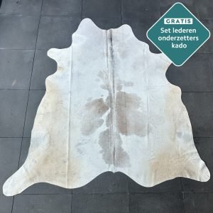 creme gevlekte koehuid