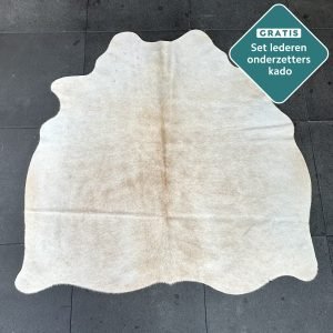 klein beige koeienvel